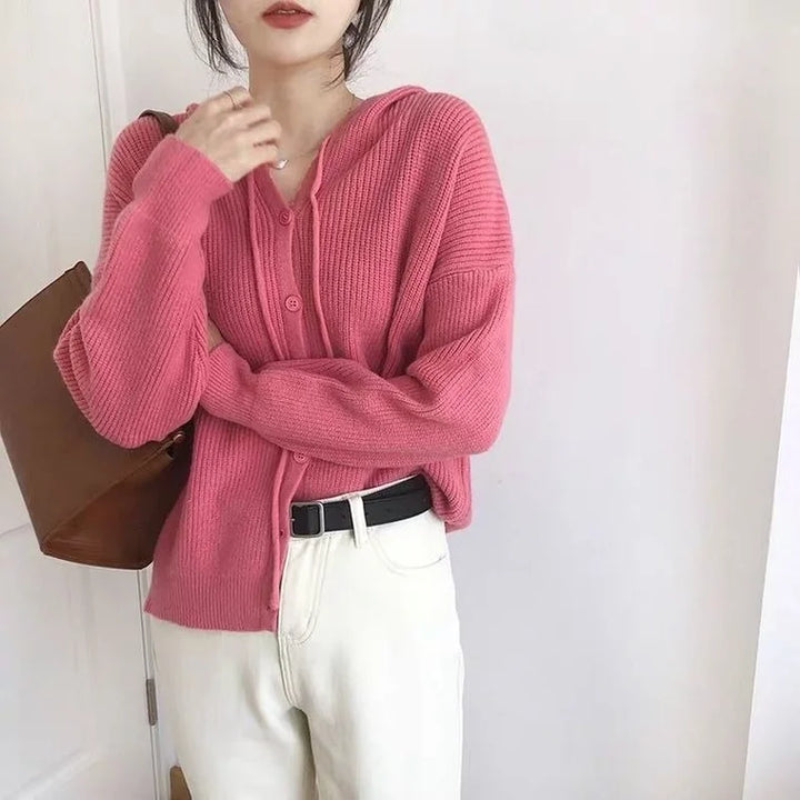 Model wearing the pink Knitted Hooded Sweater 