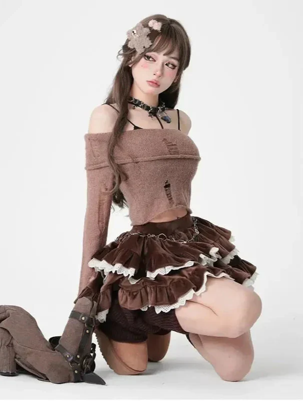 Woman in a brown dress with ruffles and a flower headband on a white background