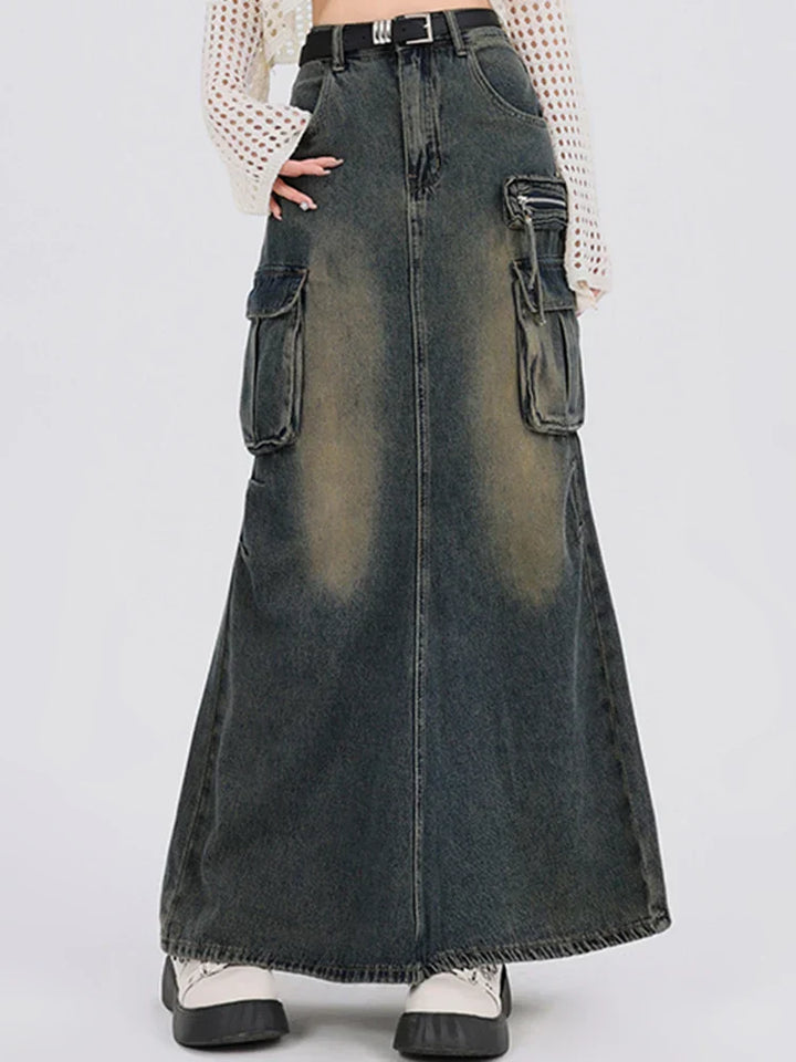 Long denim skirt with pocket details on a white background